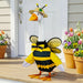 Evergreen Giddy the Goose Bee Outfit with yellow stripes, bee wings, and floral straw hat