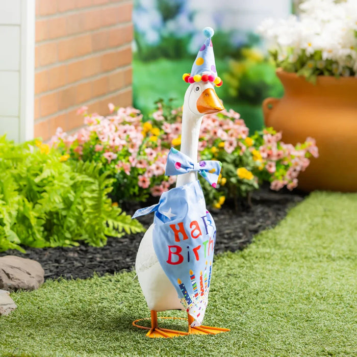 A festive duck in a birthday hat, holding a colorful bag, symbolizing a joyful birthday party.