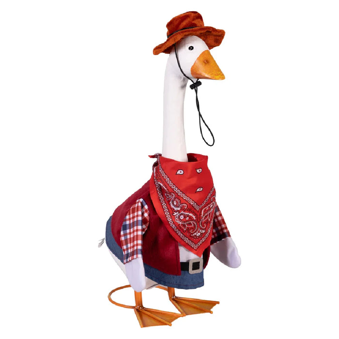 A cowboy-clad duck stands on a porch, creating a charming and amusing outdoor scene.