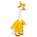 A duck dressed in a raincoat sits on a porch, showcasing its playful attire.