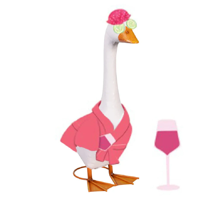 A duck in a pink outfit stands on a porch, enhancing the cheerful atmosphere of the outdoor space.