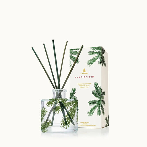 Frasier Fir diffuser with packaging on a white background