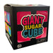 Box of 'Giant Sugar Cube' with colorful text and warning label on a white background