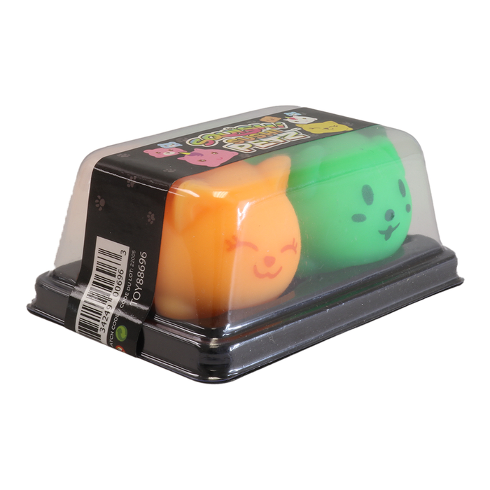 Two colorful cat-shaped erasers in a clear plastic packaging on a white background
