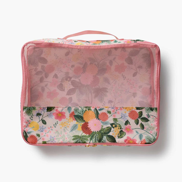 A set of packing cubes designed to keep clothing and travel essentials neatly organized for stress-free packing.