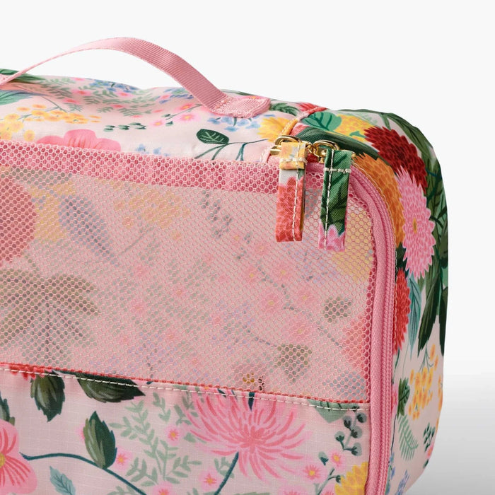 A set of packing cubes designed to keep clothing and travel essentials neatly organized for stress-free packing.