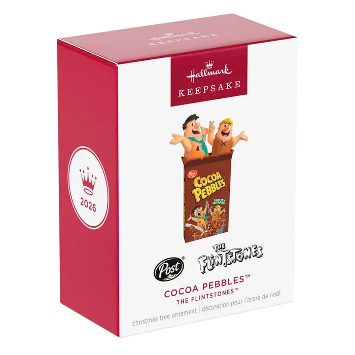 2026 Hallmark Keepsake Cocoa Pebbles Flintstones ornament box featuring Fred and Barney popping out of brown cereal packaging