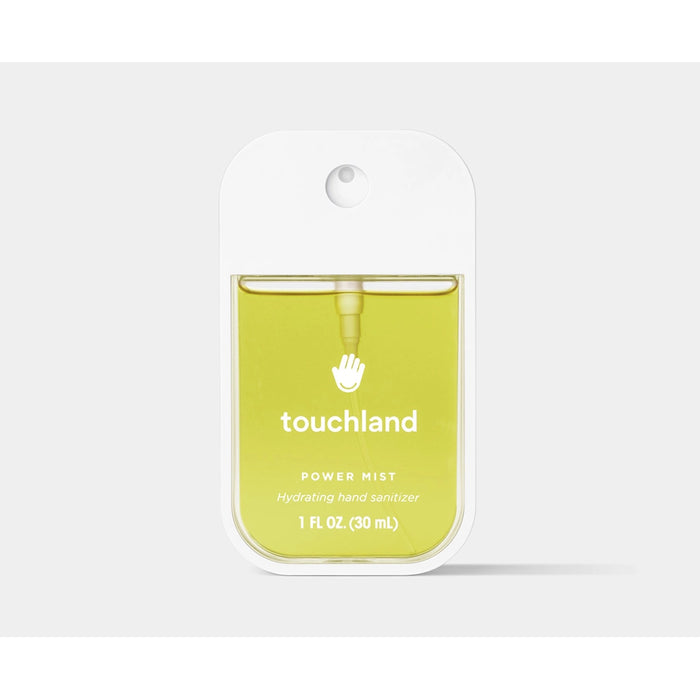 Touchland Vanilla Blossom Power Mist hydrating hand sanitizer with yellow liquid in sleek white case.