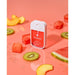 Touchland Wild Watermelon Power Mist hydrating hand sanitizer surrounded by fresh fruit slices.