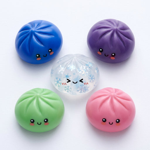 RMS Mystery Dumpling Snowflake Edition Squishy in light blue packaging showing six colorful dumpling characters.