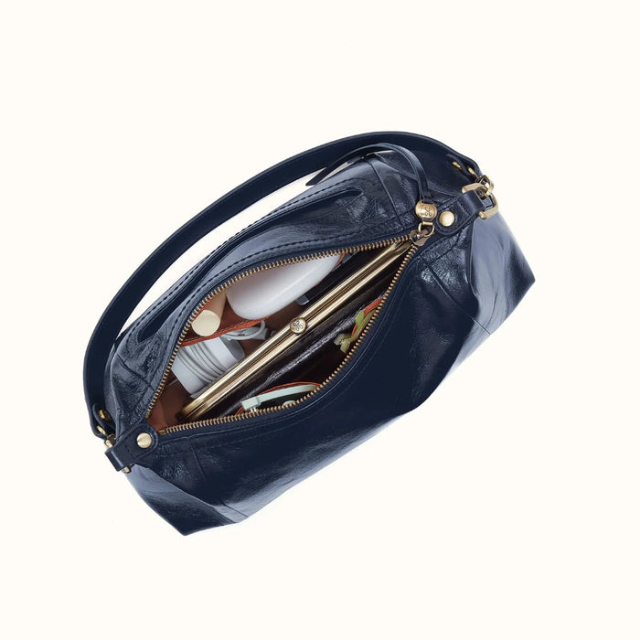 The HOBO Darcy Medium Shoulder Bag in Ink Navy gives you everyday style and serious carrying power. 