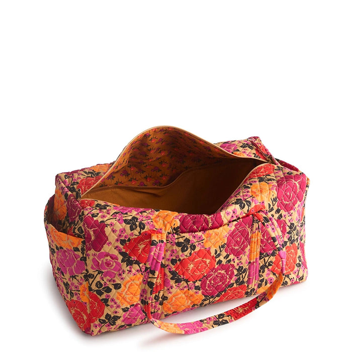Open view of Vera Bradley Large Original Duffel Bag in Coming Up Roses displaying roomy interior with floral lining.
