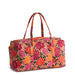 Side view of Vera Bradley Large Original Duffel Bag in Coming Up Roses showing quilted fabric texture and double handles.