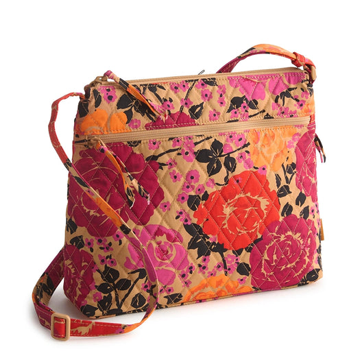 Vera Bradley Original Zip Hipster in Coming Up Roses, front view with quilted floral design and adjustable strap.