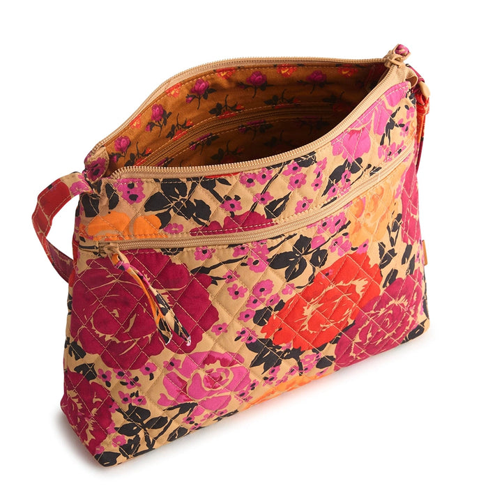 Open view of Vera Bradley Original Zip Hipster in Coming Up Roses showing interior floral lining and compartments.
