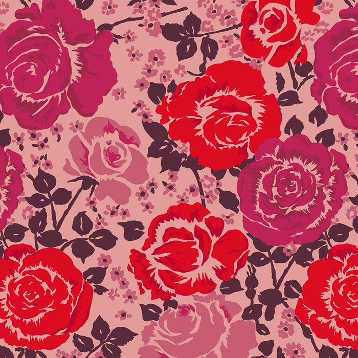 Close-up of Coming Up Roses Pink floral pattern with red and fuchsia roses and dark leaves from Vera Bradley plush throw blanket.