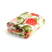 Folded Vera Bradley Plush Throw Blanket in Strawberry Vines fleece pattern with colorful strawberries and green leaves on a cream background