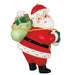 Decorative figurine of Santa Claus holding a sack with gifts on a white background