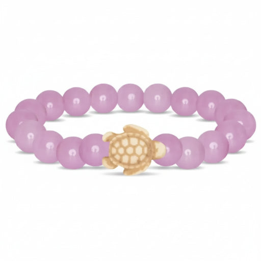 Fahlo Journey Lilac Glow Sea Turtle Bracelet with glow-in-the-dark lilac beads, sea turtle charm, real turtle tracking, and marine wildlife conservation support.