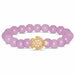 Fahlo Journey Lilac Glow Sea Turtle Bracelet with glow-in-the-dark lilac beads, sea turtle charm, real turtle tracking, and marine wildlife conservation support.
