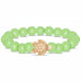 Fahlo Sage Glow Bracelet with glow-in-the-dark sage beads, engraved turtle charm, interactive real sea turtle tracking, and wildlife conservation support.