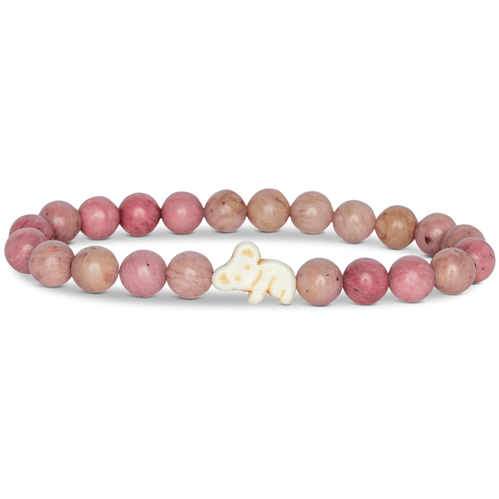 Bracelet with pink beads and a white Koala charm on a white background