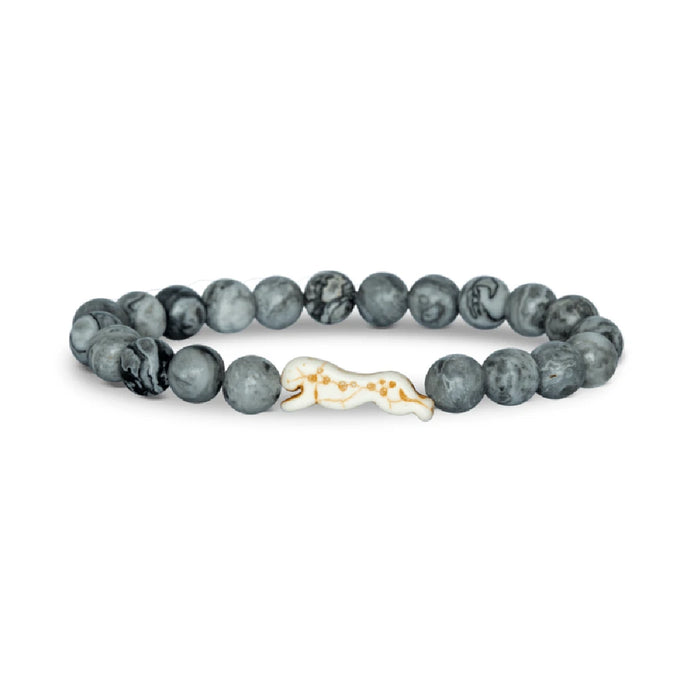 A bracelet featuring a detailed horse charm, showcasing equestrian-themed jewelry design.