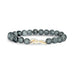 A bracelet featuring a detailed horse charm, showcasing equestrian-themed jewelry design.