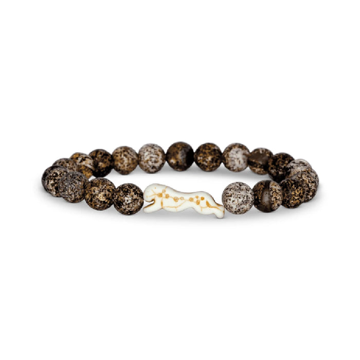 A bracelet featuring a combination of white and brown stones, elegantly arranged for a stylish look.