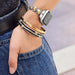 Brighton Pretty Tough Heart Watch Band in a two-tone silver and gold finish featuring heart accents and signature studded detailing for a stylish smartwatch accessory.