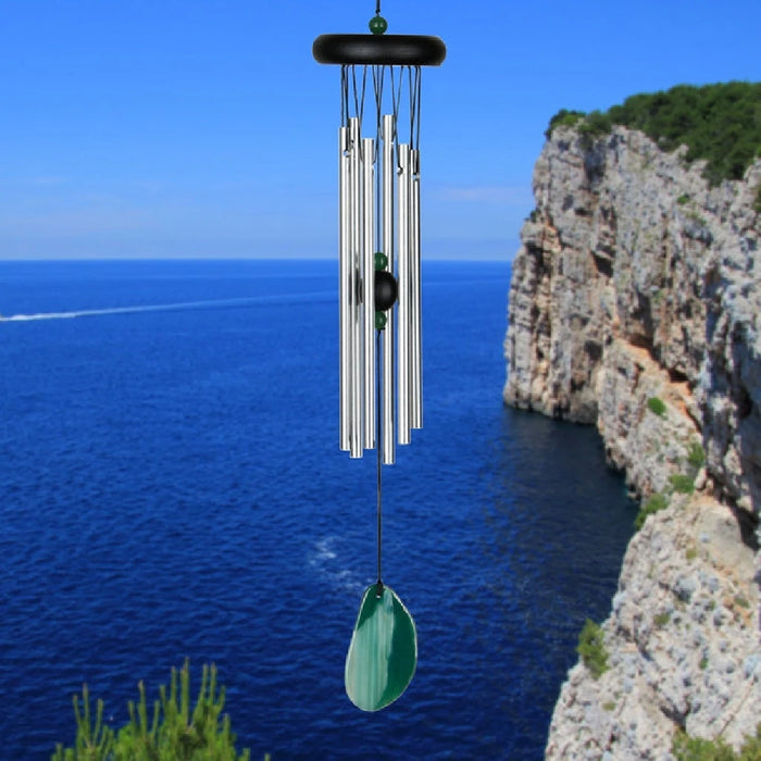 Elegant stone wind chime with green agate representing balance and nature