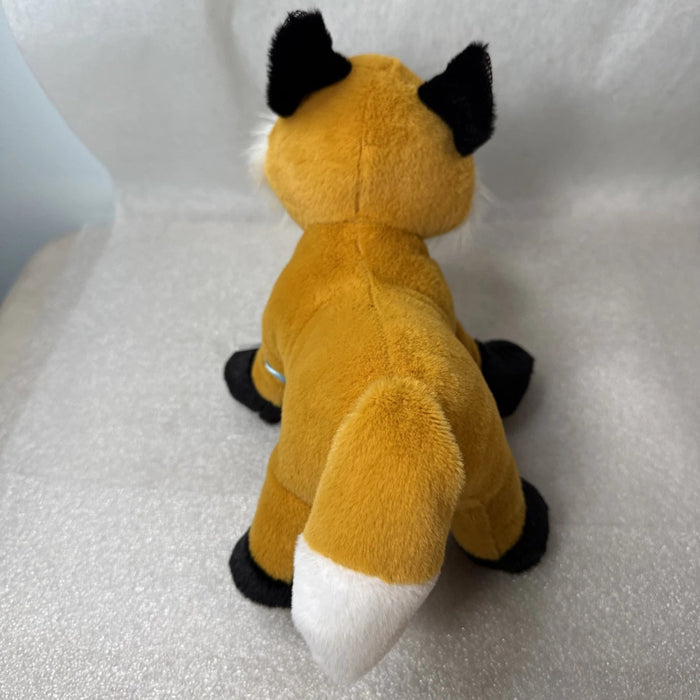 This charming fox features sweet facial details and a huggable design that's perfect for playtime, bedtime, or display.