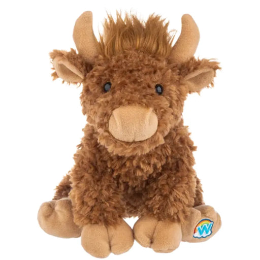 A brown fluffy Highland cow plush toy with light tan horns, snout, and feet, sitting against a plain white background. A small blue and white 'W' logo patch is visible on one foot.