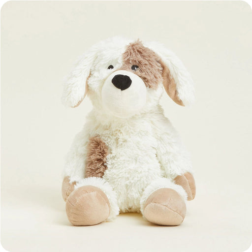 Warmies Puppy Plush soft microwavable stuffed dog sitting upright on a neutral background