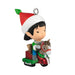 Christmas ornament of a child with a Santa hat riding a horse.