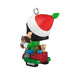 Christmas ornament with a character in a red hat and green outfit on a white background