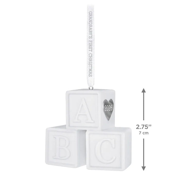 Hallmark 2026 Grandbaby's First Christmas porcelain ornament with stacked ABC blocks, silver heart detail, and embossed ribbon hanger