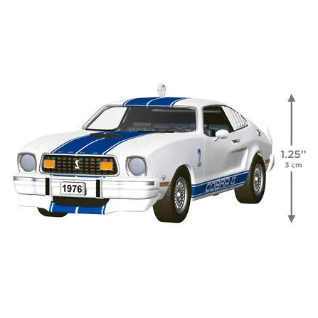 White 1976 Ford Mustang Cobra II ornament scale shot showing 1.25 inch height