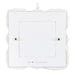 White decorative photo frame ornament with scalloped edge on a white background