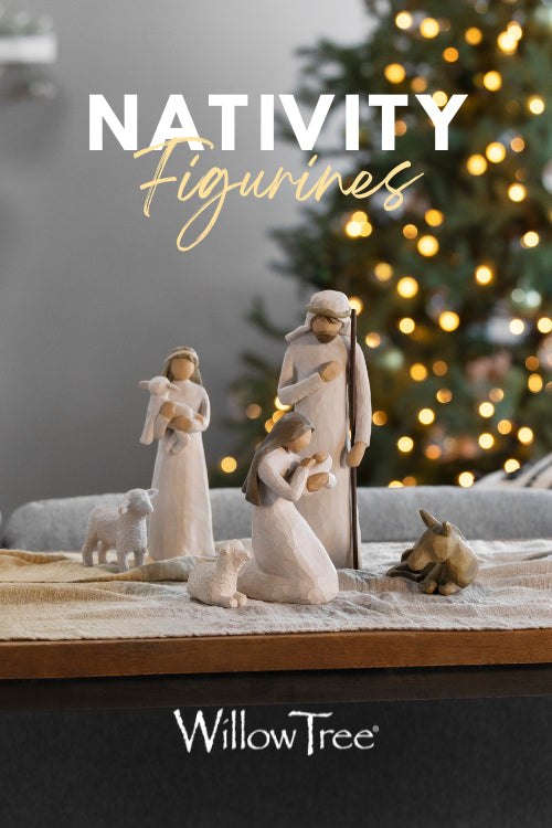 Willow Tree Nativity figurines with a Christmas tree in the background, featuring the Willow Tree brand.