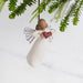 Willow Tree With Love ornament – hand-painted resin angel with wire wings holding red heart, symbolic holiday or love-themed gift.