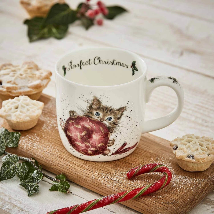 Wrendale Designs Purrfect Christmas Kitten Mug on a wooden board with festive treats and decor