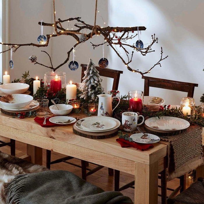 Festive holiday dining table setting featuring Wrendale Designs dinnerware and Rockin’ Robins mug.