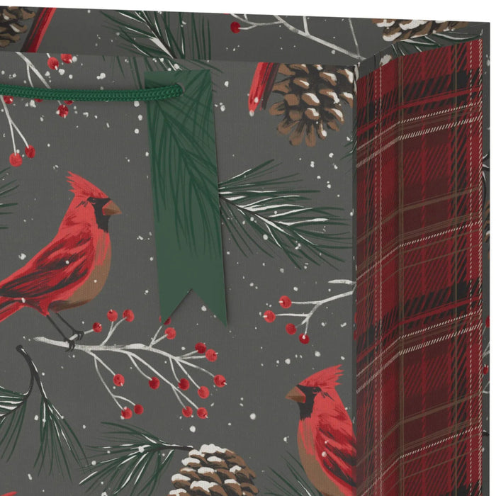 13-inch large Christmas gift bag featuring cardinals and pine cones on a gray background with an included gift tag.