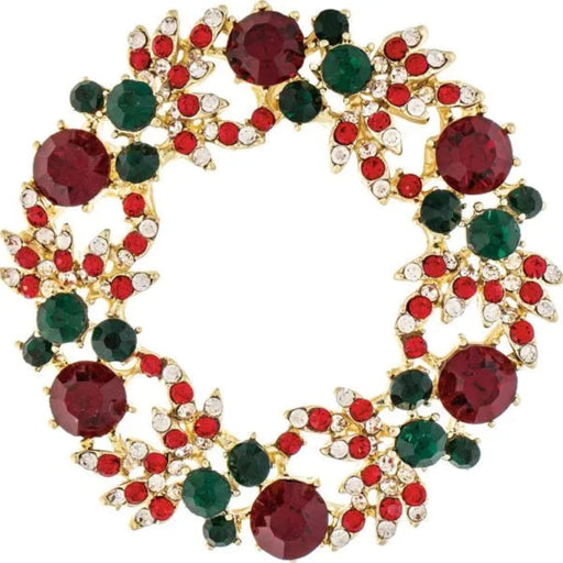 Rain Jewelry gold-tone Christmas wreath brooch featuring red and green crystal accents in a festive holiday design.