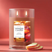 Yankee Candle Apple Pumpkin Large Tumbler burning beside apple slices – cozy autumn scent.