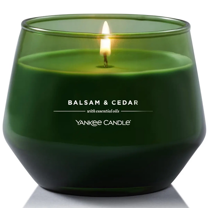 Yankee Candle Balsam & Cedar Studio Collection – green glass jar candle with essential oils.
