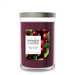 Yankee Candle Cranberry Chutney candle with cranberries and leaves on a white background