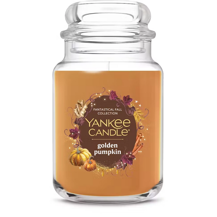 Yankee Candle golden pumpkin candle jar on a white background