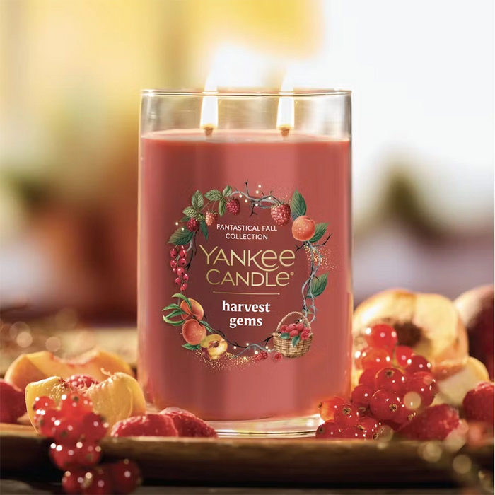 Yankee Candle harvest gems candle with fruits on a blurred background